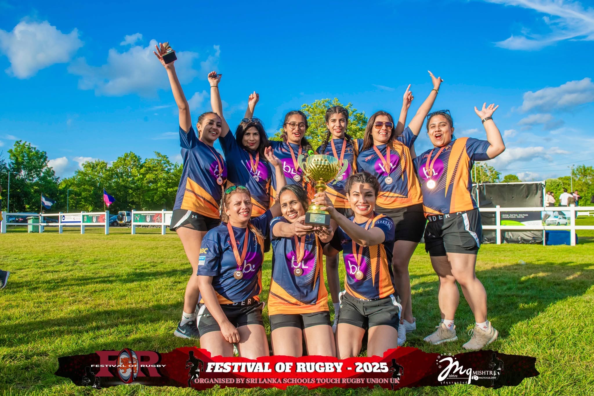 Women's rugby team celebrating with trophy at Festival of Rugby 2025